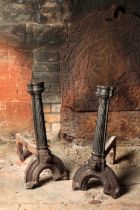 A PAIR OF WROUGHT IRON ANDIRONS