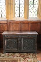 A CHARLES II OAK COFFER