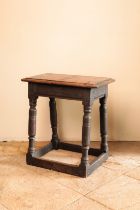 A CHARLES II OAK JOINED STOOL