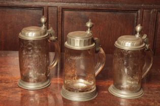 A PAIR OF GERMAN GLASS PINT TANKARDS