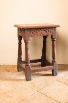 A CHARLES II OAK JOINED STOOL