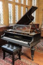 A BOUDOIR GRAND PIANO