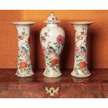 A GARNITURE OF THREE CHINESE EXPORT FAMILLE ROSE VASES