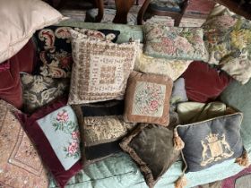 A COLLECTION OF CUSHIONS