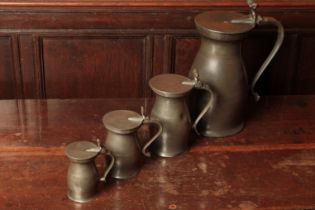A GRADUATED SET OF FOUR WILLIAM III PEWTER BALUSTER WINE MEASURES