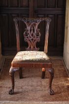 A GEORGE II WALNUT CHAIR