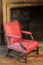 A GEORGE III MAHOGANY "GAINSBOROUGH" ARMCHAIR