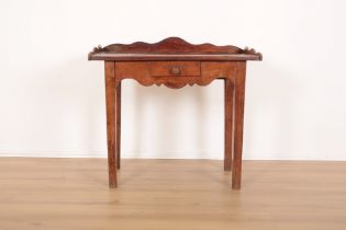 A CONTINENTAL PITCHED PINE SIDE TABLE