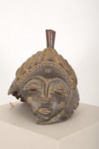 A BAULE AFRICAN JANUS HELMET MASK