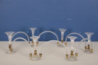 A SET OF SIX GLASS AND GILT METAL EPERGNES