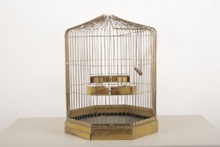 A LARGE OCTAGONAL BRASS BIRD CAGE