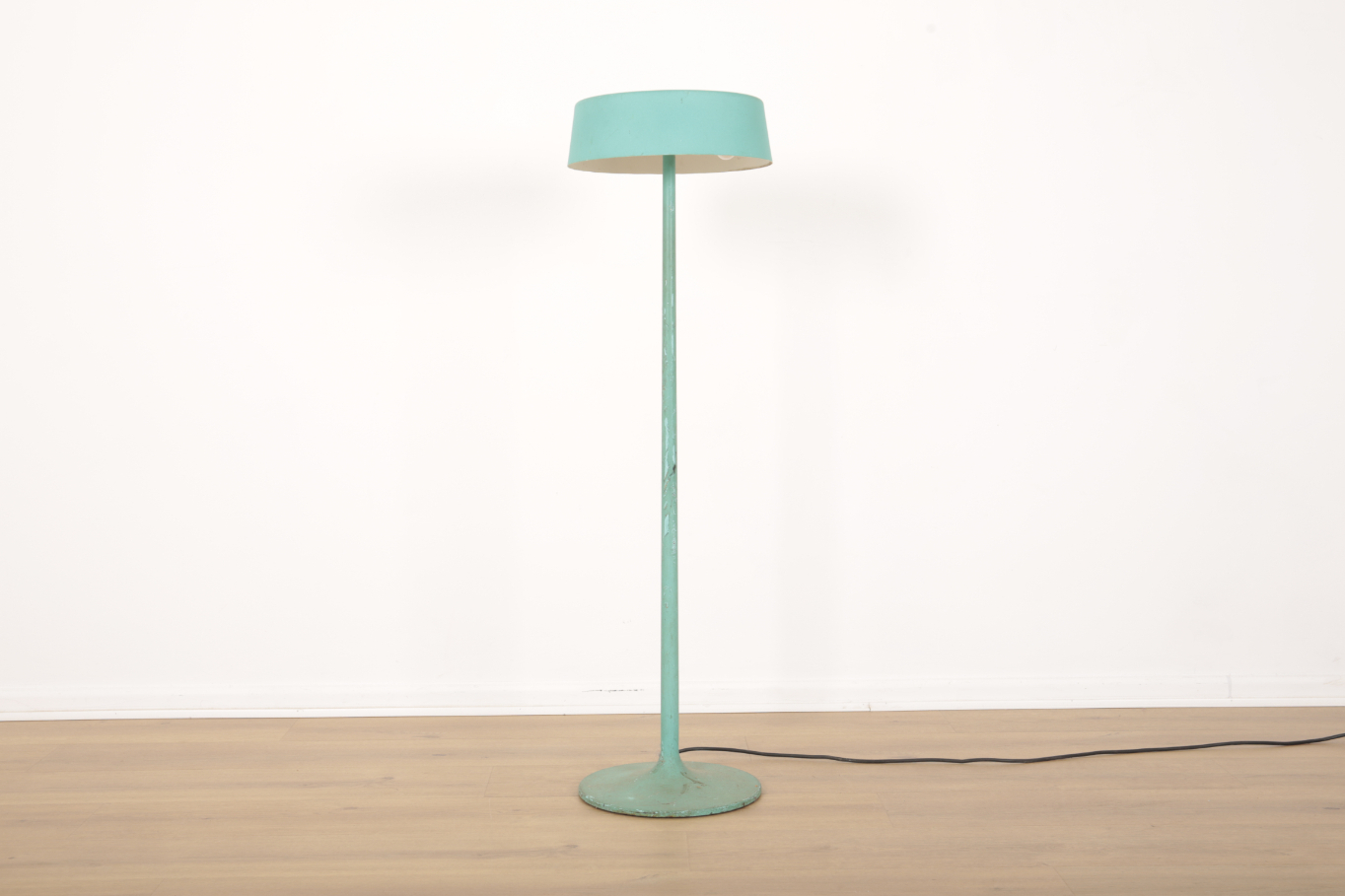 A METAL TURQUOISE FLOOR LAMP BY HABITAT