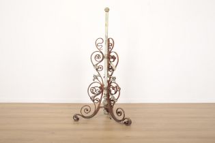 AN EARLY 20TH CENTURY ART NOUVEAU WROUGHT IRON LAMP BASE