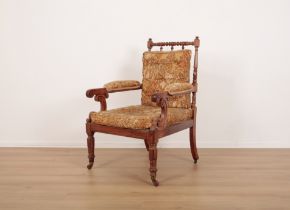 A WILLIAM IV WALNUT ARMCHAIR