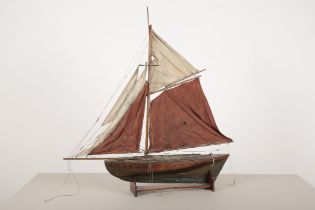 A VINTAGE WOODEN POND YACHT