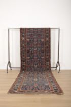 AN ANTIQUE NORTH WEST PERSIAN RUNNER