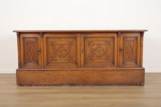 AN EDWARDIAN PITCH AND GRAINED PINE SHIP'S CABINET