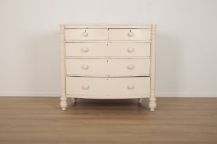 A VICTORIAN WHITE-PAINTED BOWFRONT CHEST OF DRAWERS