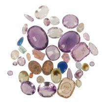 A COLLECTION OF FACETED AND ROUGH GEMSTONES
