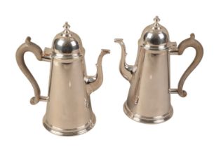 A PAIR OF GEORGE I STYLE SILVER PLATED COFFEE POTS