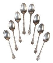 A SET OF EIGHT SILVER VICTORIAN 'LIONS MASK AND FEATHER EDGE' TEASPOONS