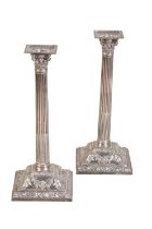 A PAIR OF GEORGE III SILVER CANDLESTICKS