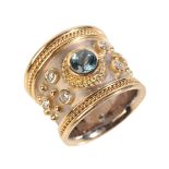 AN AQUAMARINE AND DIAMOND ETRUSCAN STYLE RING
