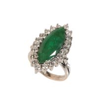 A 4.02 CARAT MARQUISE EMERALD AND DIAMOND CLUSTER RING