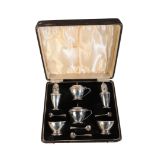 A GEORGE VI SILVER SIX PIECE CRUET SERVICE OF ART DECO DESIGN