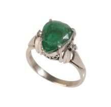 A 3.25 CARAT PEAR CUT EMERALD AND DIAMOND RING