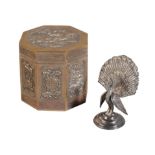 A TIBETAN WHITE METAL OCTAGONAL LIDDED BOX