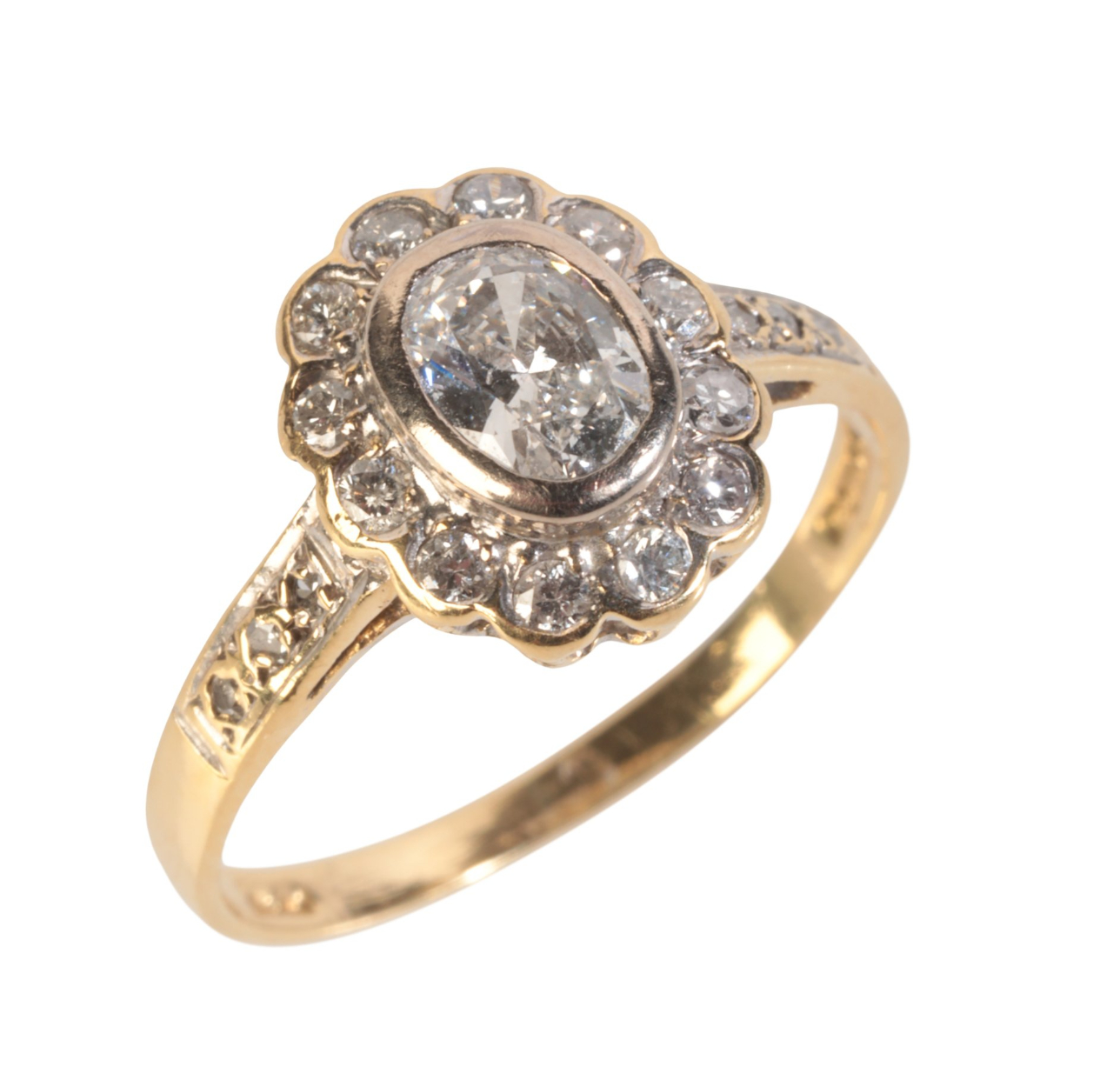 AN OVAL CUT DIAMOND CLUSTER RING