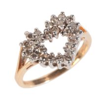 A DIAMOND HEART CLUSTER RING