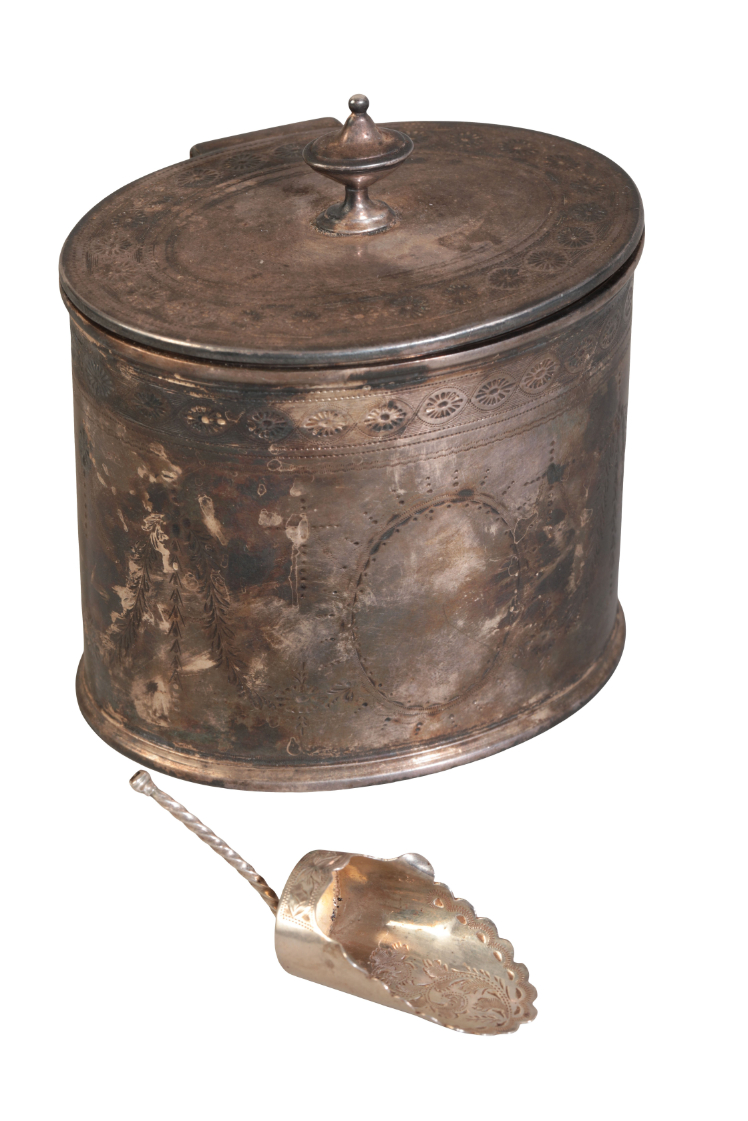 A GEORGE III SILVER TEA CADDY