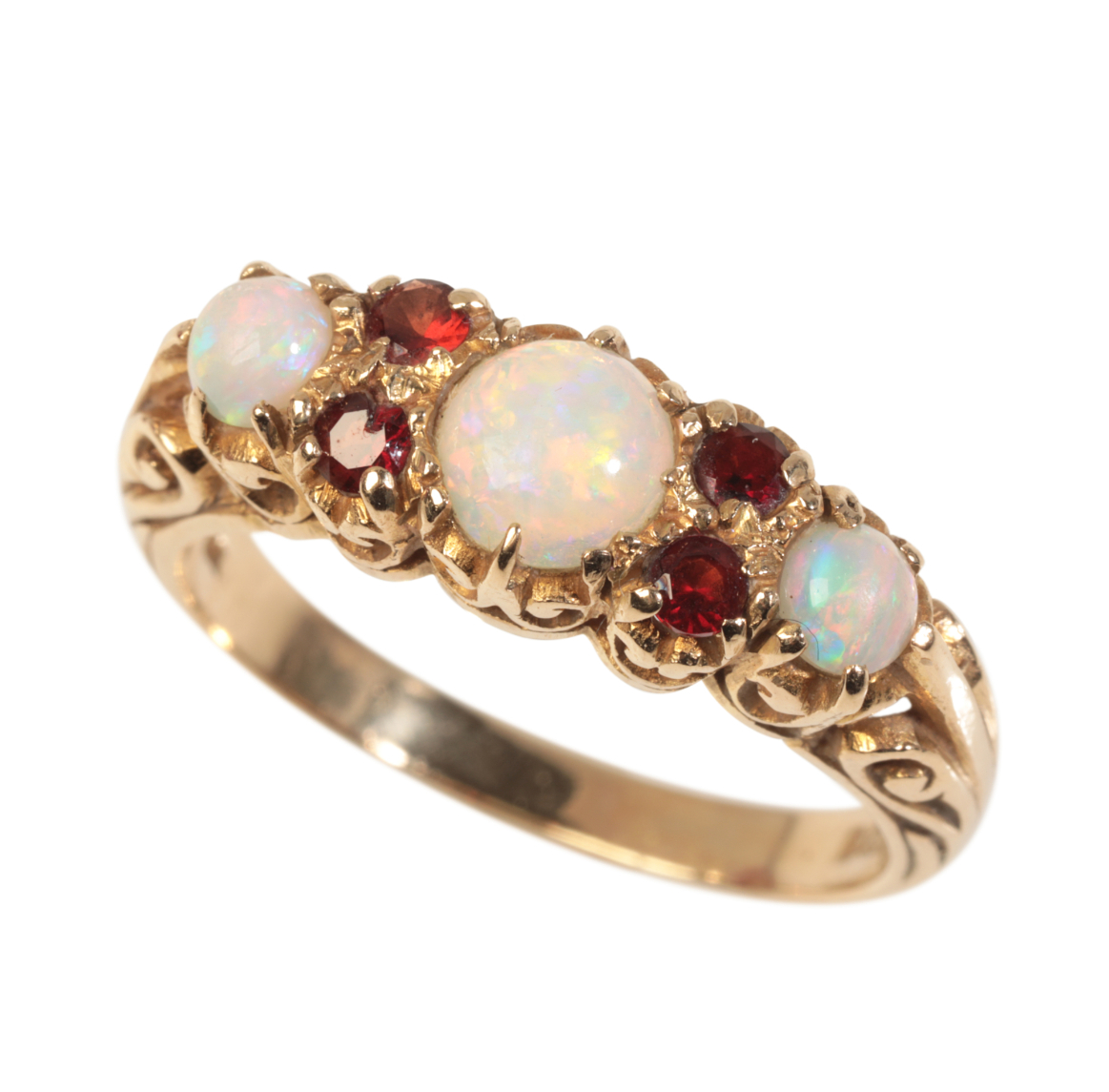 A VINTAGE OPAL AND GARNET RING