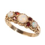A VINTAGE OPAL AND GARNET RING
