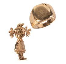 AN ANTIQUE SIGNET RING AND DOLL PENDANT