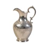 A VICTORIAN SILVER JUG