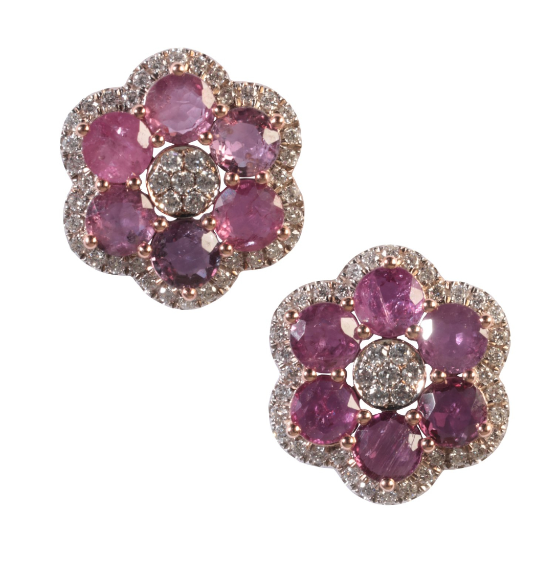 A PAIR OF RUBY AND DIAMOND CLUSTER STUD EARRINGS