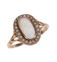 AN ANTIQUE OPAL AND PEARL CLUSTER RING