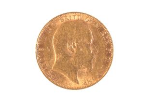 A 1910 EDWARD VII GOLD HALF SOVEREIGN