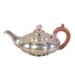 A GEORGE V SILVER TEAPOT