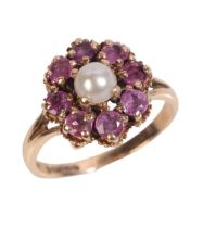 A PEARL AND RUBY CLUSTER RING
