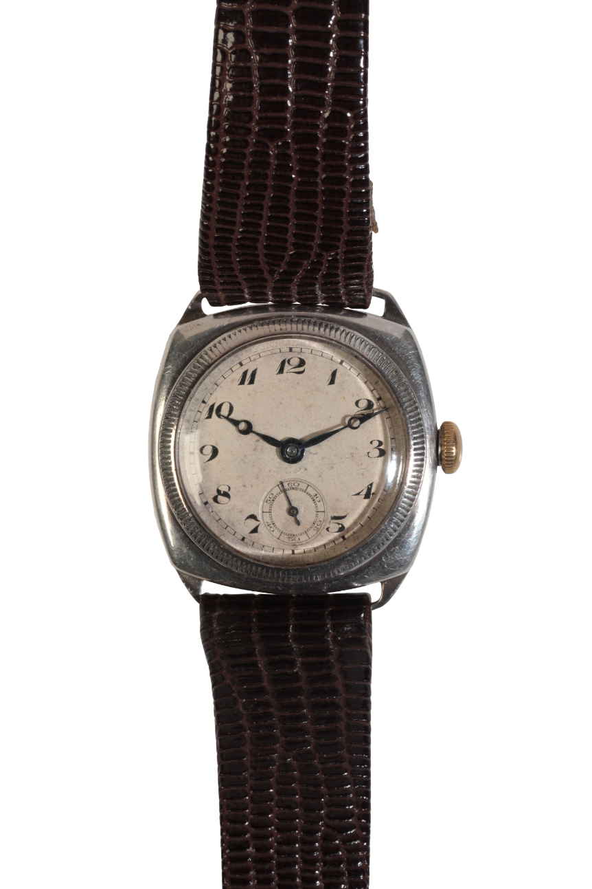 A GENTLEMAN'S SILVER CUSHION CASE WRISTWATCH