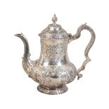 A GEORGE IV IRISH SILVER COFFEE POT