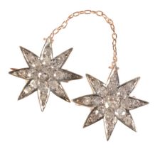 A PAIR OF ANTIQUE VICTORIAN STAR BROOCHES