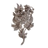 AN ANTIQUE DIAMOND FLOWER BROOCH