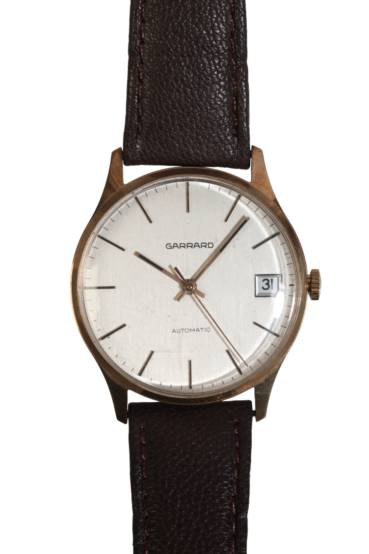 GARRARD: A GENTLEMAN'S 9CT GOLD WRISTWATCH