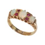 AN ANTIQUE OPAL AND RUBY RING