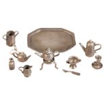 A CONTINENTAL WHITE METAL DOLLS HOUSE TEA SERVICE